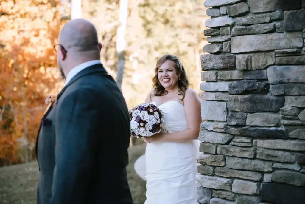 A couple enjoy their first look at Southern Charm Events in Rock Hill, SC as shot by Charlotte wedding photographer Claudia Wolff